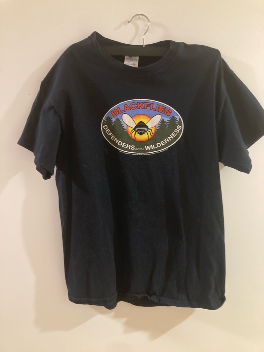 Liberty Graphics Tee Organic Peace Knot and Black flies Defender of Wilderness